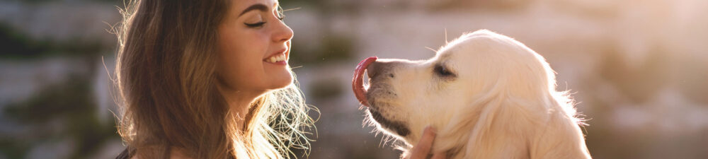 Woman with golden retriever